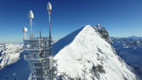 Radio antenna on mountain peak in wintertime Stock Footage 86855508