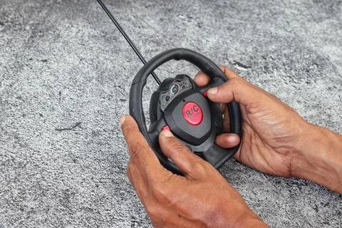 Radio control remote in man's hands. Stock Photos