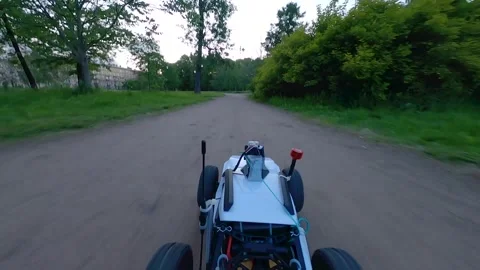 Radio-controlled car with a camera in the park Stock Footage 246575285