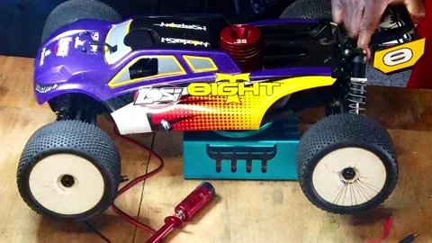 Radio Controlled Nitro Car High Revs On A Stand Stock Footage 220033787