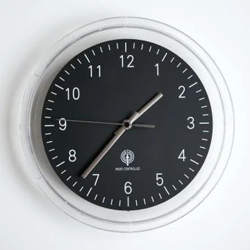 Radio controlled wall clock Stock Photos