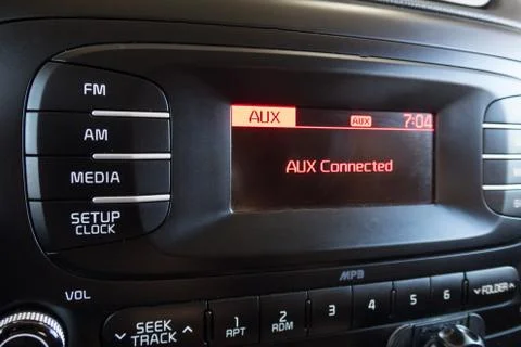 RADIO FM AM button inside a car. Crop fragment. Photos