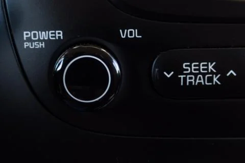 Radio FM AM button inside a car. Crop fragment. Photos