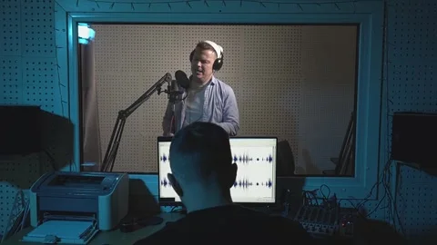 Radio host speaks into microphone Video stock 242844719