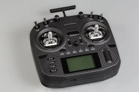 Radio remote control with screen display on a gray background 写真素材