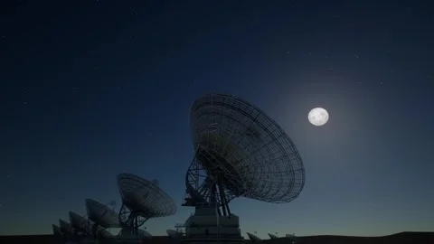 Radio Telescope Array Under Full Moon and Starry Night Sky Stock Footage 339071192