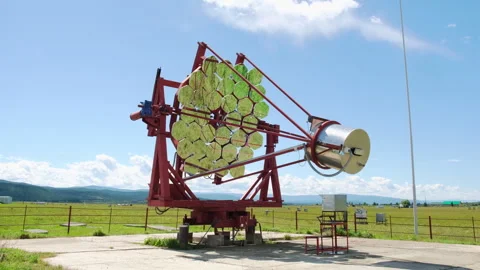 Radio telescope in an open area during the day Stock Footage 253624845
