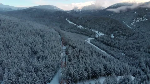 Radio tower in a winter forest with snow covered trees beautiful winter Stock Footage 149738846
