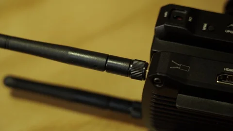 Radio video transmitters. The man prepares the transmitter. Video stock 130142445