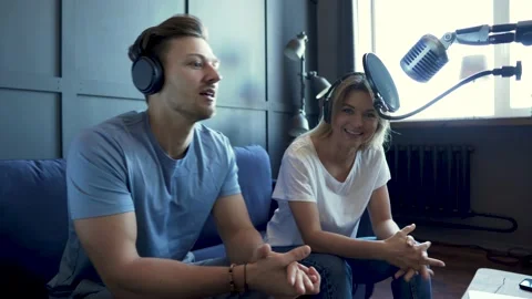 Radio worker having interview with guest in recording studio Stock-Footage 233625325