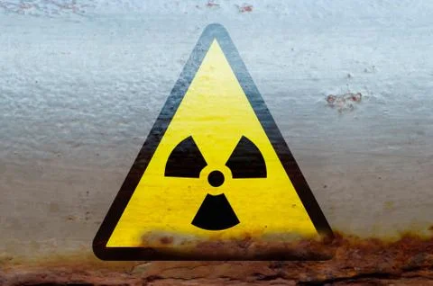 Radioactive radiation warning on the rusty container Stock Photos