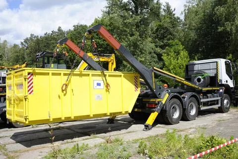 Radioactive waste storage container loading on a truck crane Stock Photos