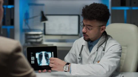 Radiologist Explaining Lung X-Ray Results to Patient Using Tablet Видео 280045371