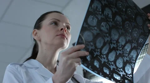 Radiologist viewing the mri brain scan Stock Footage 60223315