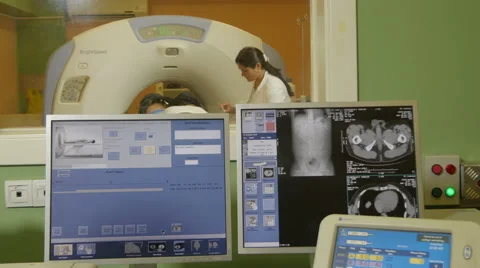 Radiology. Technician giving injection t... | Stock Video | Pond5