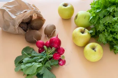 Radish bunch on orange background Foto stock