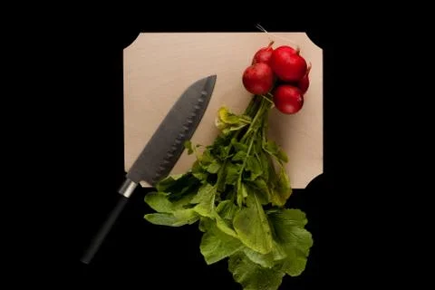 Radish with knife Stock Photos