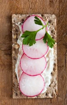 Radishes on crispbread Stock Photos