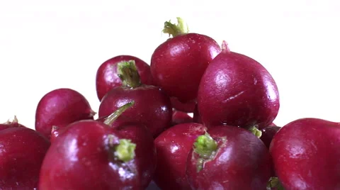 Radishes isolated rotating on white background Vídeo Stock 62308629