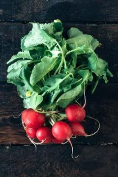 Radishes on table Stock Photos