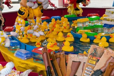 Raditional hook a duck game at a carnival Stock Photos