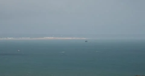 The RAF dropping supplies via parachute into trhe sea on a training exercise Vídeos de archivo 302514065