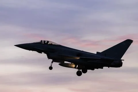 RAF Typhoon landing at sunset Stock Photos