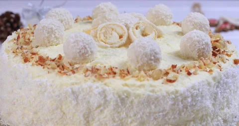 Raffaello cake with coconut flakes and almonds Stock-Footage 163436665