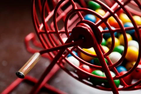 Raffle game with different colored balls seen from the side Stock Photos