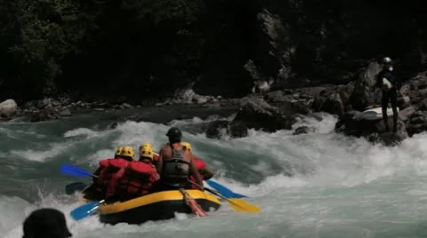 Raft collapses while trying to beat the white water Stock Footage