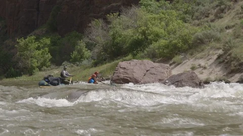 Raft Spinning Down Green River White Water Rapids Dinosaur National Monument Stock Footage 121590746