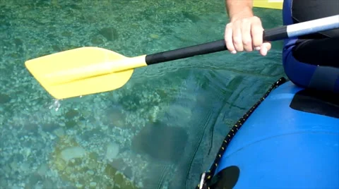 Rafters paddle through water Video stock 46786105