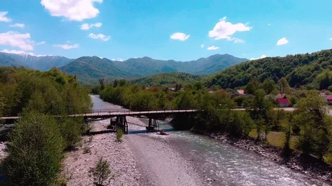 Rafting on a catamaran on a mountain river. View from quadrocopter. Stock Footage 97627957