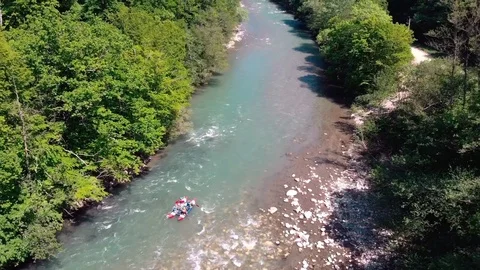Rafting on a catamaran on a mountain river. View from quadrocopter. Stock Footage 97628007
