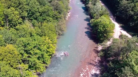 Rafting on a catamaran on a mountain river. View from quadrocopter. Stock Footage 97628019