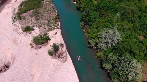 Rafting on a catamaran on a mountain river. View from quadrocopter. Stock Footage 97628143