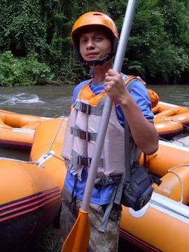Rafting instructor posing at the river at bali Stock Photos