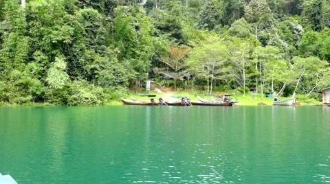 Rafting on the lake Ratchaprapa Surat Thani, Thailand Stock Footage 44483393