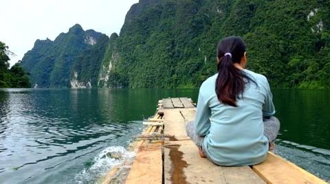 Rafting on the lake Ratchaprapa Surat Thani, Thailand Stock Footage 44484436