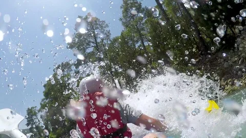 Rafting on a mountain river and a lot of splashing into the camera Stock Footage 101877321