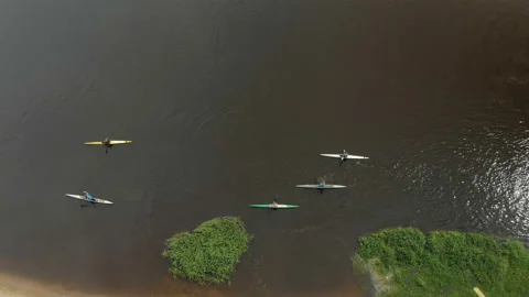 Rafting on the river on kayaks against the flow of water 動画素材 115474334