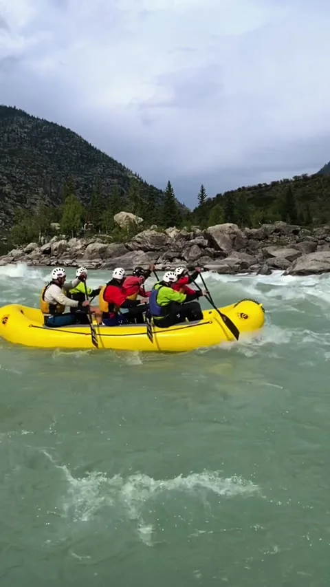 Rafting on stormy mountain river on inflatable raft. Stock Footage 170472846