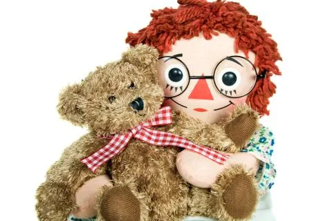 Rag doll with stuffed bear Stock Photos