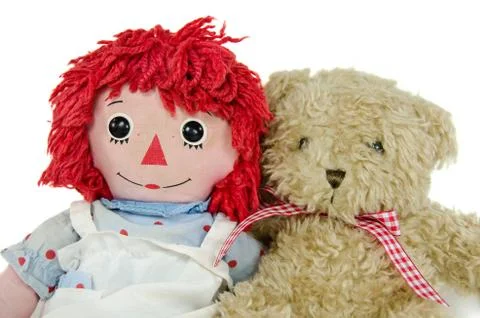 Rag doll with teddy bear Stock Photos