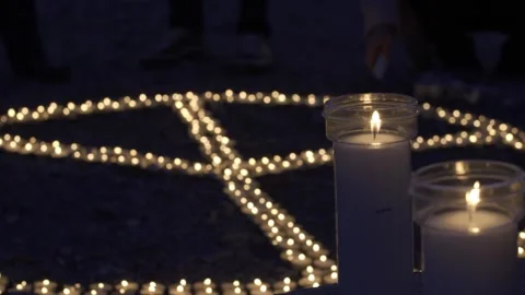 Rag shot of burning candles Stock Footage 147024524