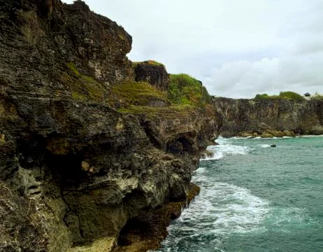 Ragged bay cliffs Stock Photos