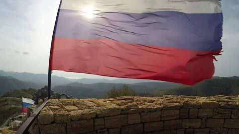 Ragged Russian flag fluttering on wind Stock Footage 71796935
