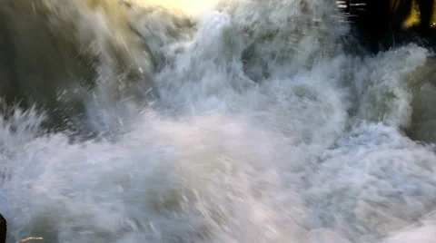 Raging clean fresh mountain river flowing between rocks in slow notion Stock Footage 54437585