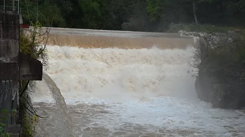 Raging dangerous flowing downstream after autumn rainfall Stock Footage 139942383