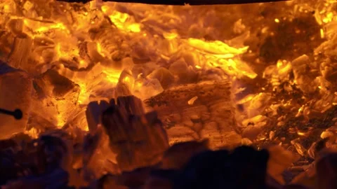A raging fire in a barrel. burning logs, boards, firewood, pine, in a barrel Stock Footage 132775859